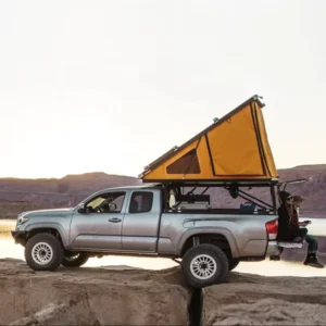 Compact Wedge Hard Shell Pickup Canopy Tent Triangle Shape Saves Space Easy Mount on Mid Size Trucks Like Nissan Navara GMC